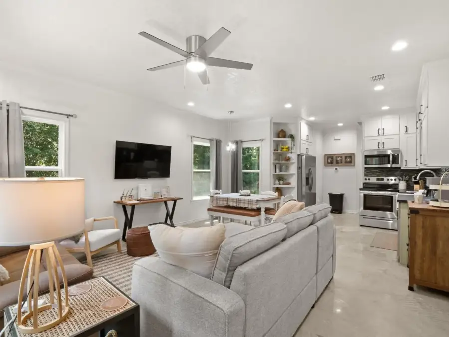 Living room view from the front door. Plenty of seating. Living room view from the front door. Plenty of seating.