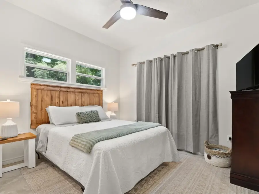 Bedroom 2 also has its own flatscreen television. Bedroom 2 also has its own flatscreen television.